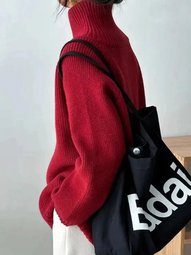 Women's turtleneck sweater with zippered side slits