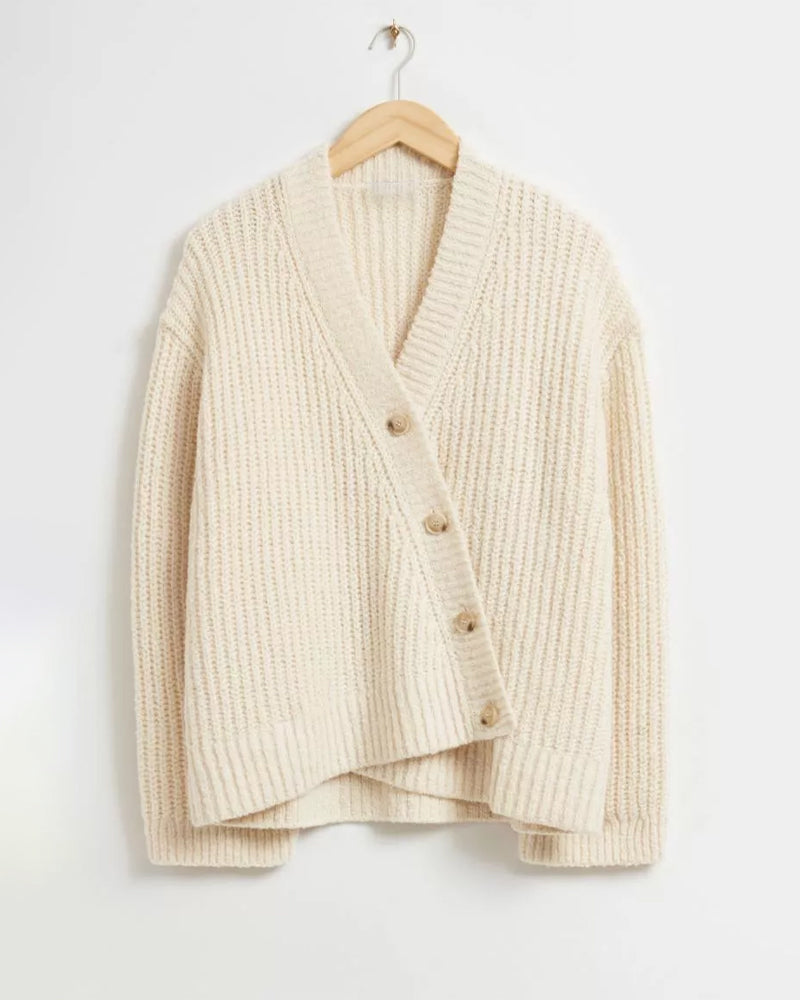 Women's knit cardigan with asymmetrical hem