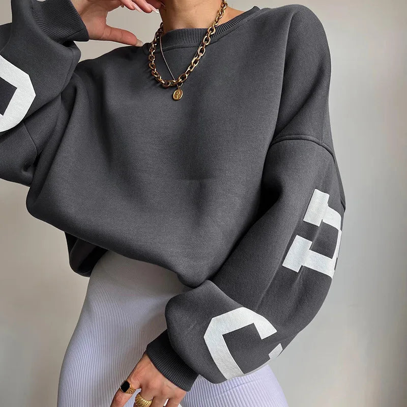 Women's bold oversized graphic sweatshirt for street-smart style