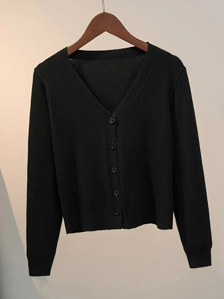 Women's knitted cardigan with V-neck and button closure