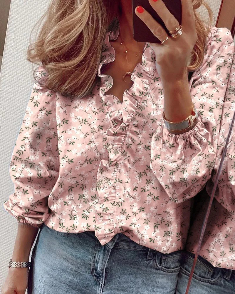 Women's ruffled V-neck blouse for a playful chic look