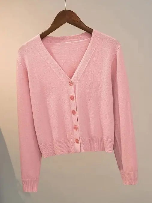 Women's knitted cardigan with V-neck and button closure