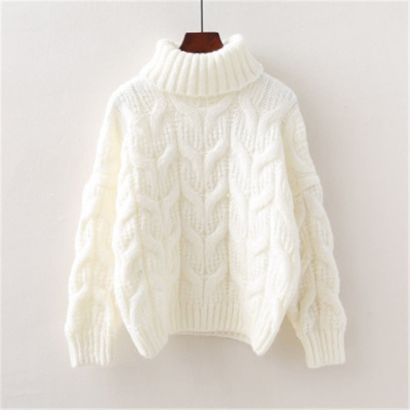 Warm and comfortable sweater with cable knit details for women