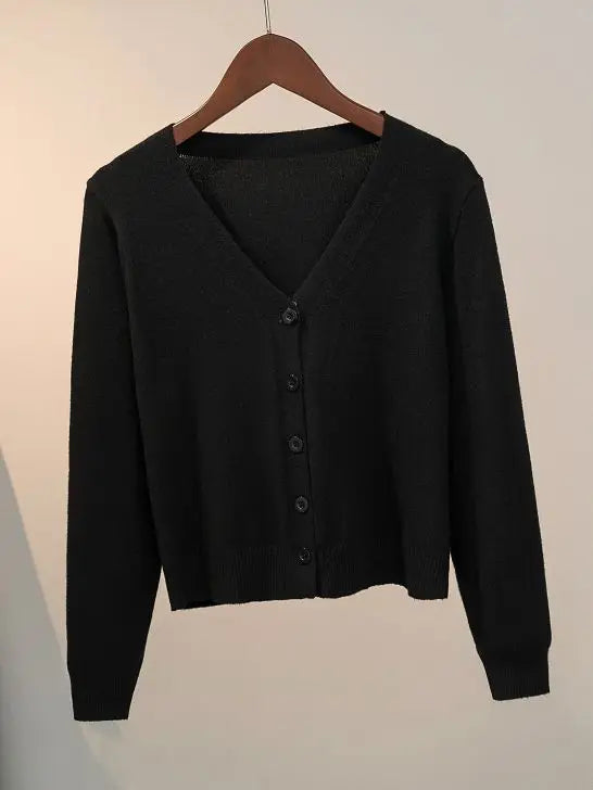 Women's knitted cardigan with V-neck and button closure