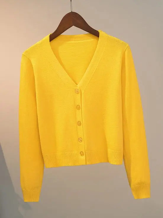 Women's knitted cardigan with V-neck and button closure
