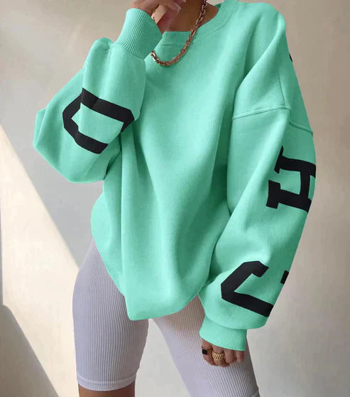 Women's bold oversized graphic sweatshirt for street-smart style
