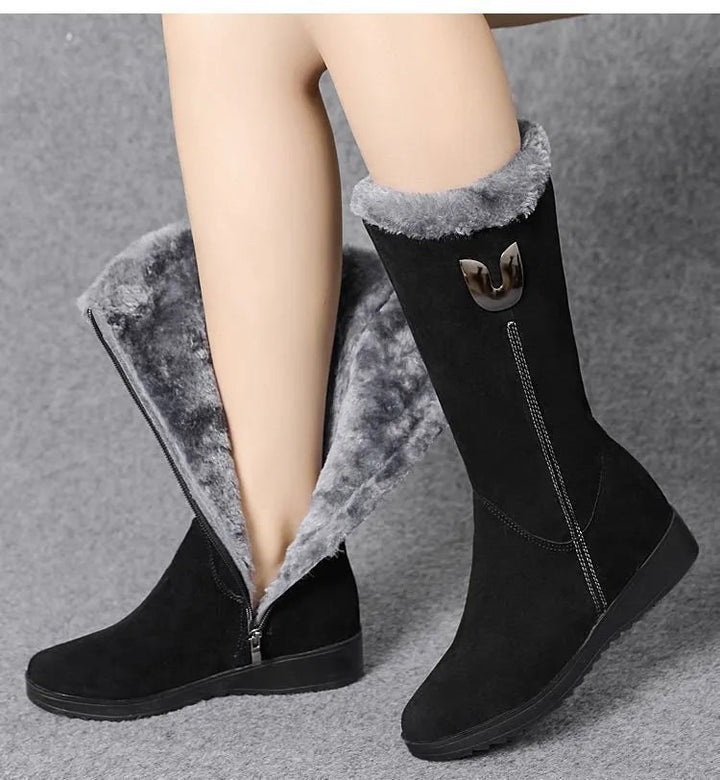 Elegant flat women's boots for casual outings and winter wear
