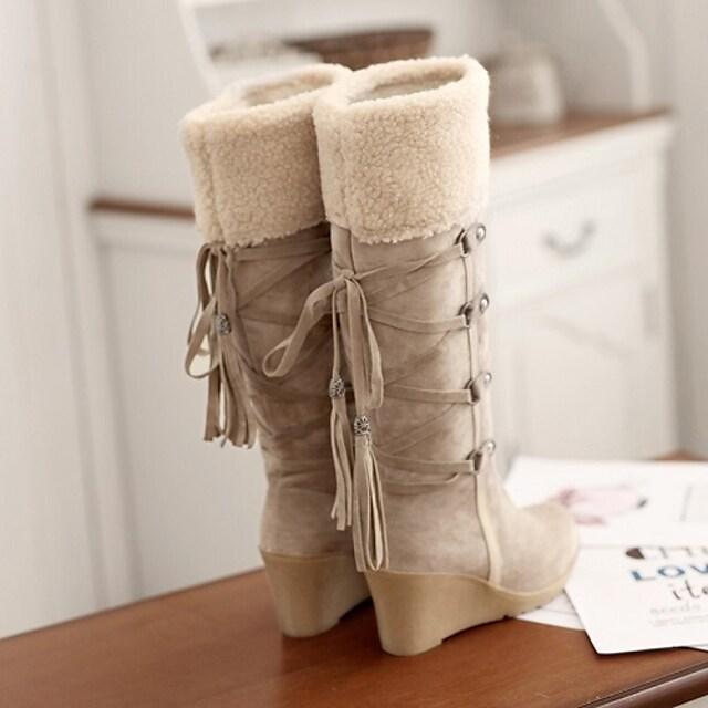 Stylish women's high snow boots with lace-up design
